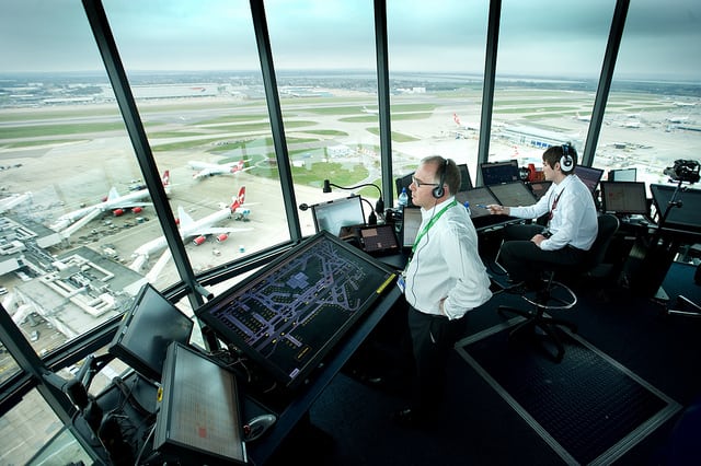 ATCs overlook operations from inside the Heathrow tower