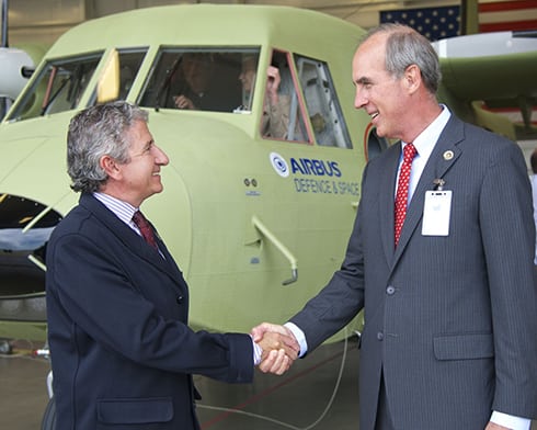 Juan Uriarte, head of Airbus Defense and Space U.S. military aircraft services greets Mobile Mayor Sandy Stimpson at the first U.S. C212 aircraft operators conference last year in Mobile, Ala. Photo: Airbus Group