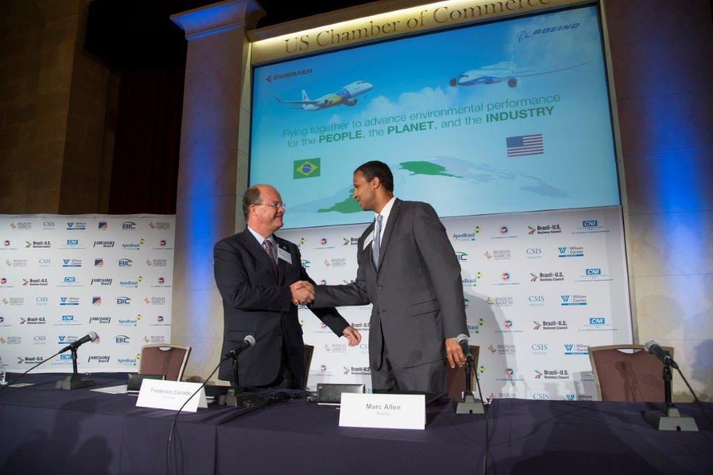 Embraer and Boeing officials sign agreement to collaborate on ecoDemonstrator.