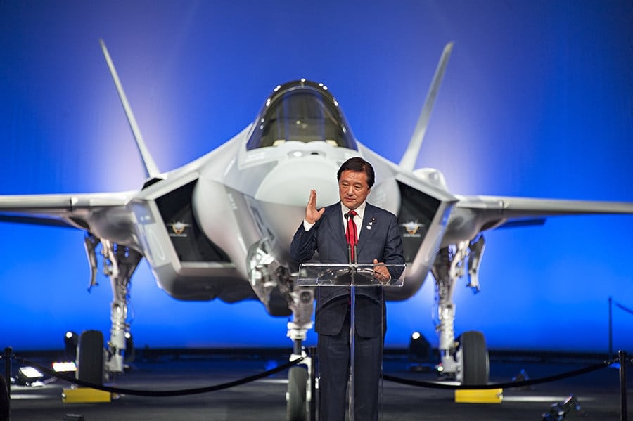 Kenji Wakamiya, Japan's State Minister of Defense, addresses the ceremony audience as Japan's first F-35A aircraft is revealed at the Lockheed Martin's production facility in Fort Worth, Texas, Sept. 23