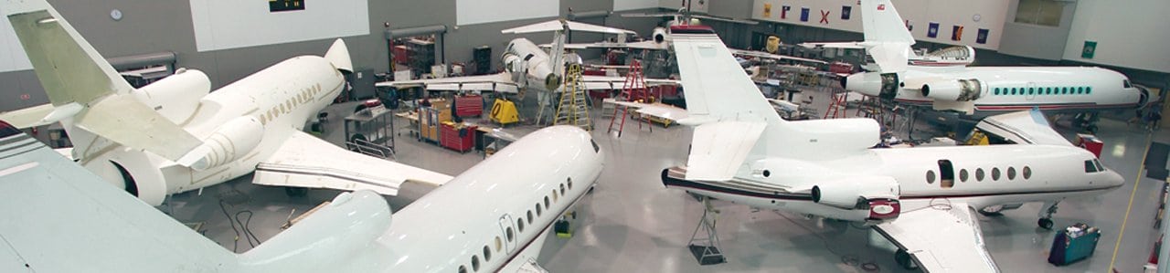 Falcon business jets in Duncan Aviation hangar