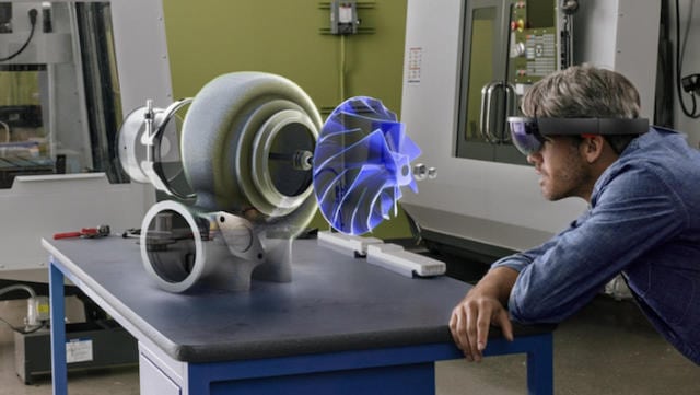 An engineer visualizes a mechanical hologram with Microsoft’s Hololens smart glass technology. Photo: Microsoft.