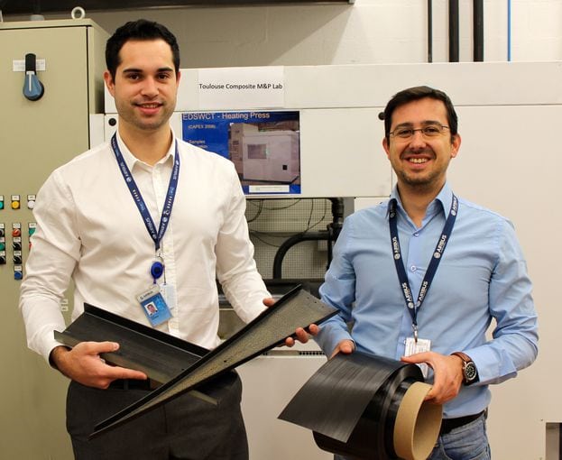 Airbus engineers displaying thermoplastic carbon-fibre reinforced plastic material