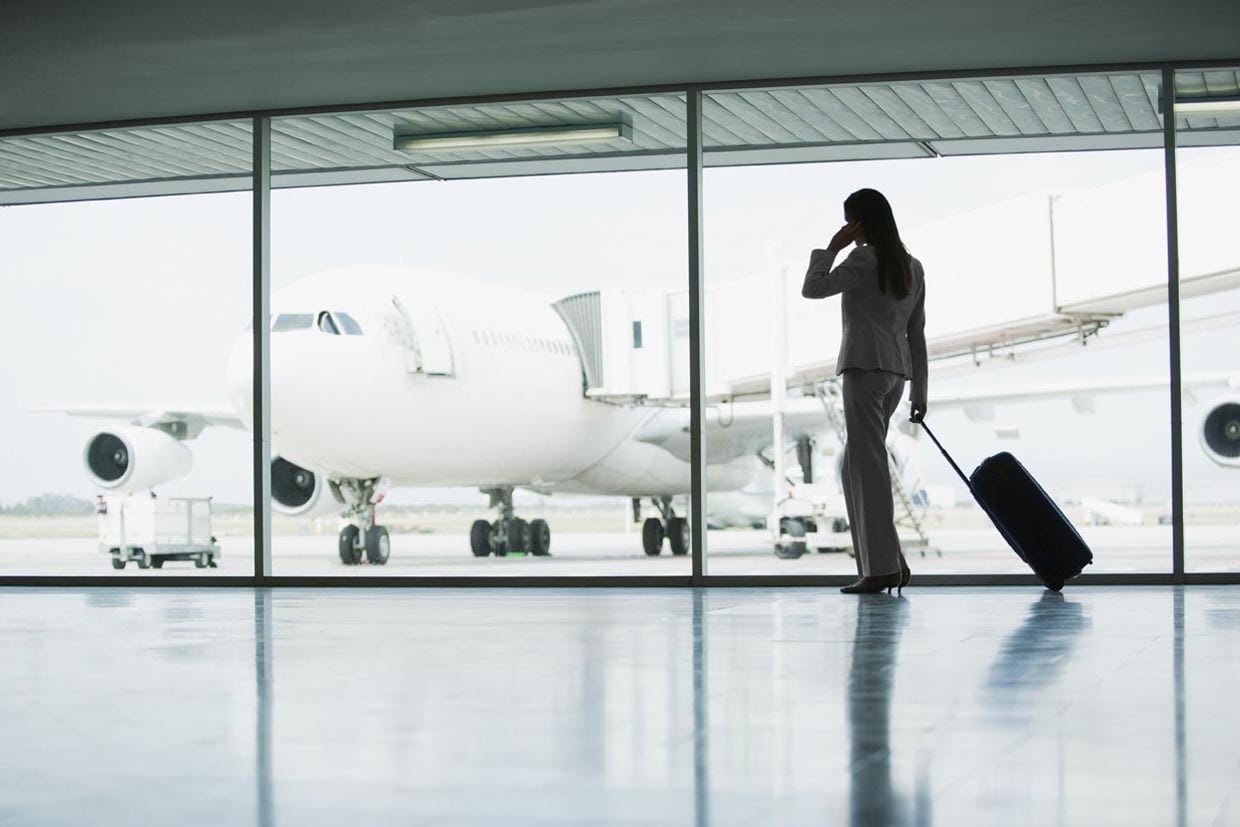 Woman on phone in airport