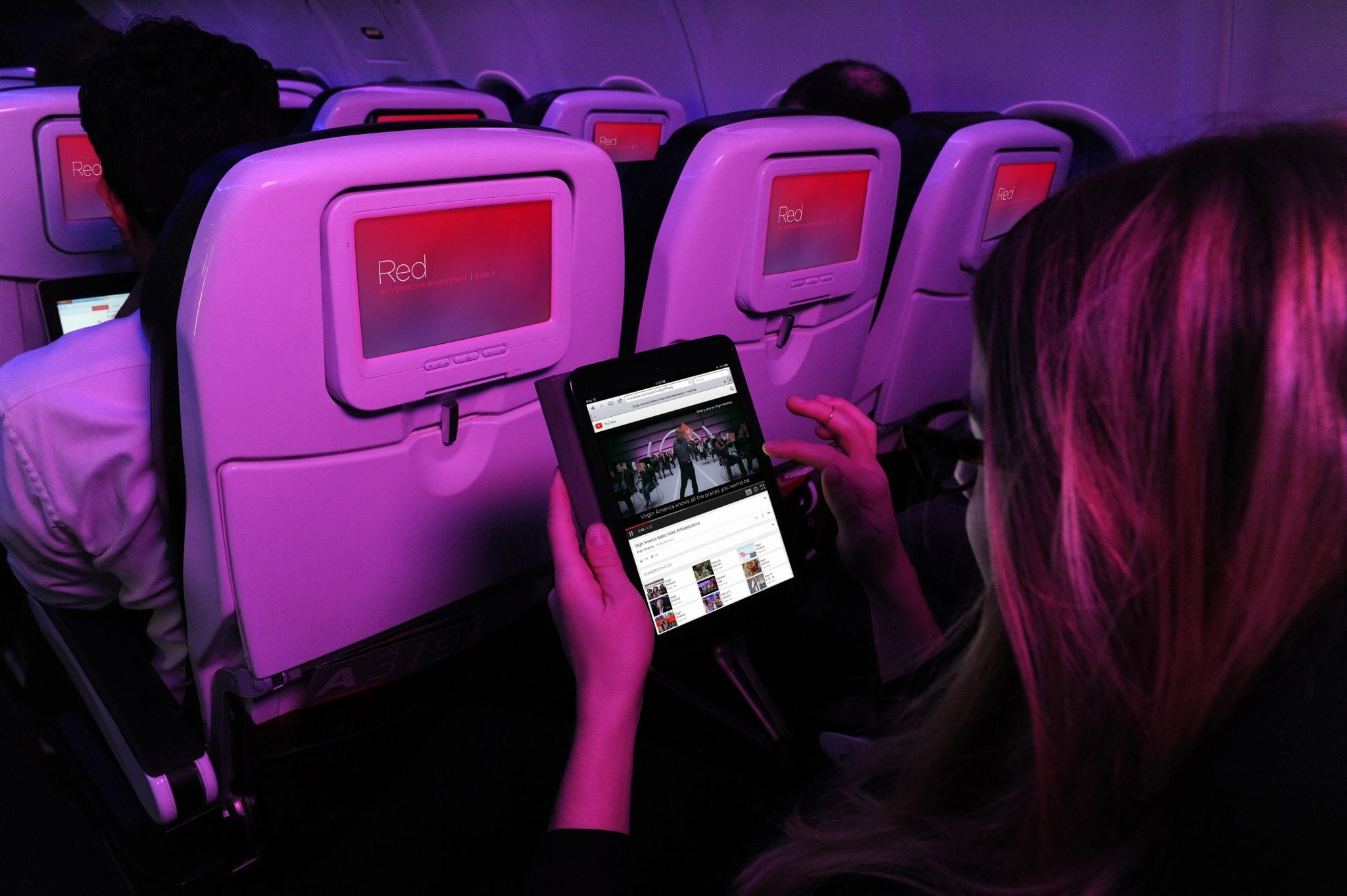 Virgin America passenger using the in-flight Wi-Fi