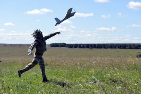 Soldier launching Desert Hawk 3 UAS