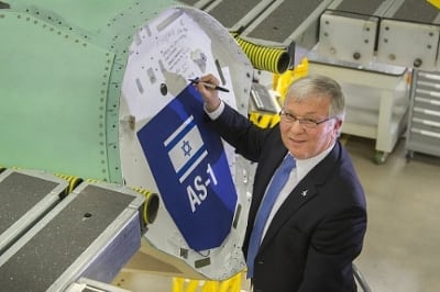 Aharon Marmarosh, director, Israel Ministry of Defense Mission in New York, leaves a commemorative message on F-35A aircraft AS-1, Israel's first F-35 