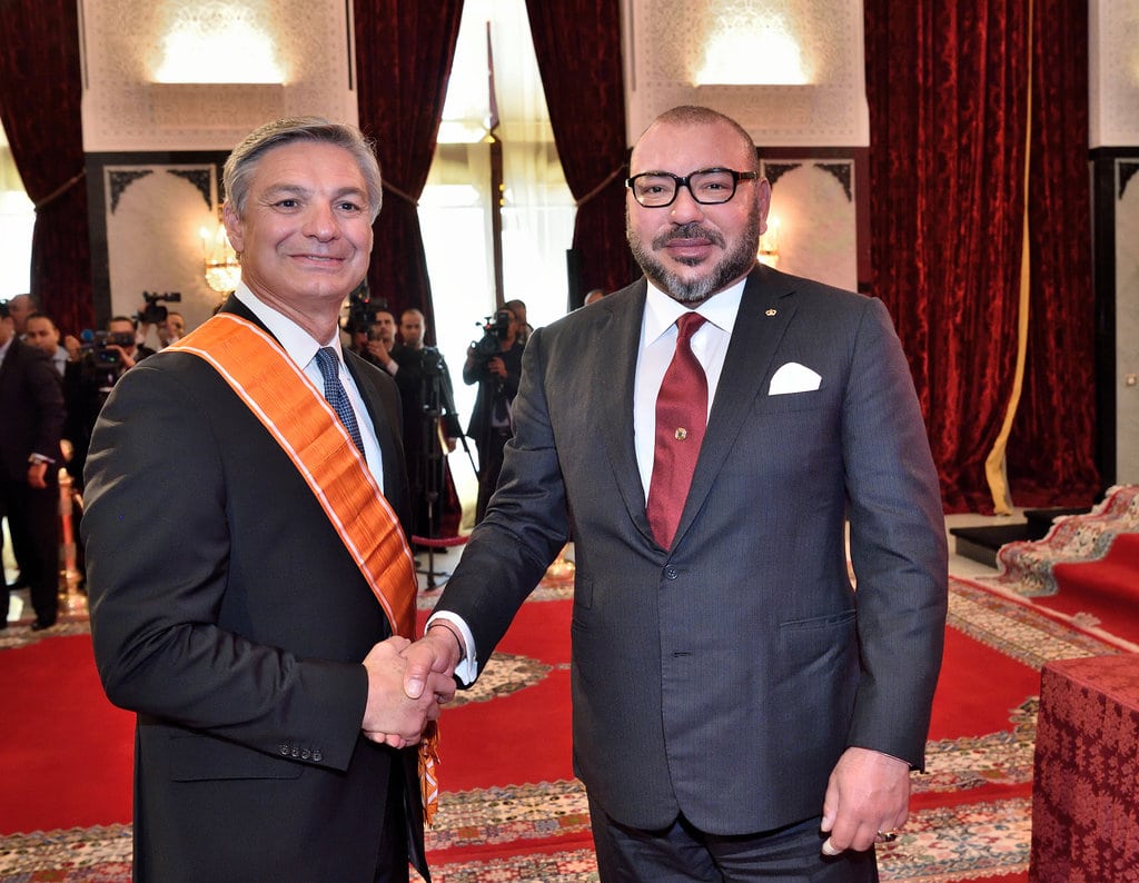 Morocco's King Mohammed VI (right) shakes hands with Raymond L. Conner, vice chairman of The Boeing Company and president and CEO of Boeing Commercial Airplanes, at a ceremony in Tangier, Morocco held September 27, 2016