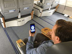 Passenger using fflya onboard Airbus A340. Photo: AS-IP