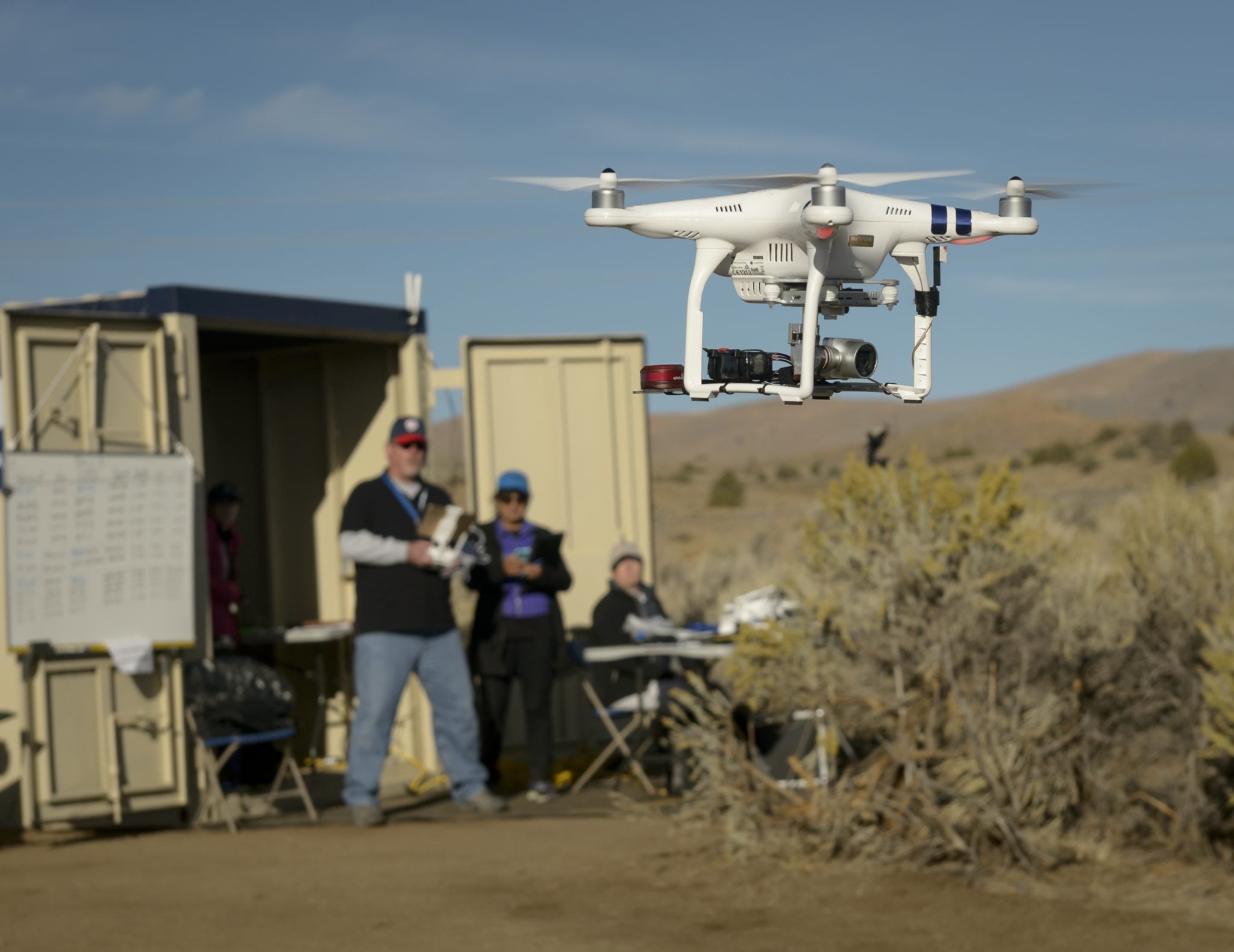 Drone Co-habitation Services operates a Phantom 3 commercial multi-rotor unmanned aircraft, one of 11 vehicles in the UTM TCL2 demonstration that will fly beyond line of sight of the pilot in command in Nevada test