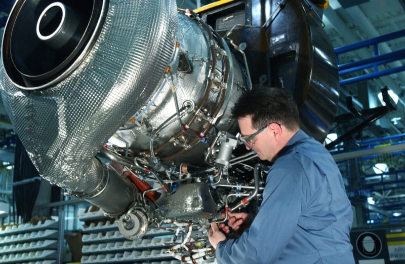 A technician works on a PW901 engine. Photo: Pratt & Whitney Canada.