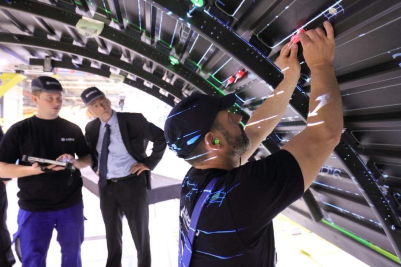 The production of A350 XWB fuselage shells at Airbus’ plant in Stade, Germany, is now being aided by an innovative ‘mixed-augmented reality application’ called “MiRA” – which facilitates and accelerates the precise positioning of brackets. Photo: Airbus.