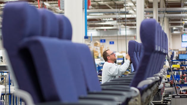 An employee from Rockwell Collins’ new Interior Systems business building airline cabin seats at its Winston-Salem, North Carolina-based facility. Photo courtesy of Rockwell Collins 