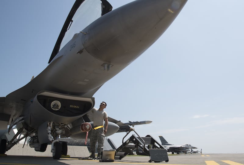 U.S. Air Force Staff Sgt. Sonethasinh Sayasaeng, a 35th Maintenance Squadron avionics technician, prepares an F-16 Fighting Falcon for an M7.1 upgrade at Misawa Air Base, Japan, July 13, 2017. The upgrade will provide pilots with more tactical information to be applied to dynamic missions. (U.S. Air Force photo by Airman 1st Class Sadie Colbert)