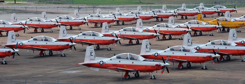 MILLINGTON, Tenn., (Aug. 28, 2012) T-6B Texan II training aircraft assigned to Training Wing (TRAWING) 5 from Pensacola, Fla., are staged on the tarmac at Millington Regional Jetport after being evacuated from their home station in preparation for Hurricane Isaac. The aircraft will remain in Millington until the storm passes. U.S. Navy photo by Mass Communication Specialist 3rd Class Ty C. Connors