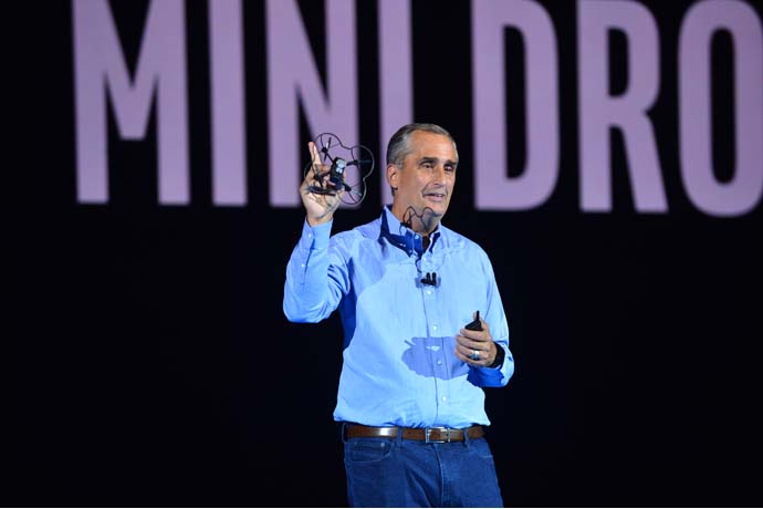 Brian Krzanich, Intel Corporation chief executive officer, displays a Shooting Star Mini drone during the 2018 Consumer Electronics Show (CES) preshow keynote address on Monday, Jan. 8, 2018, in Las Vegas. One hundred of the mini drones were later displayed in an indoor light show. Intel displays how the power of data is affecting our daily lives at the event, which runs Jan. 9-12. (Credit: Walden Kirsch/Intel Corporation)