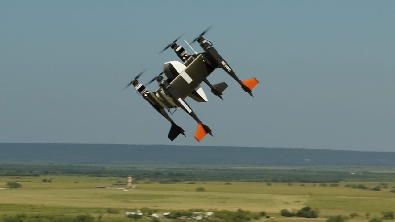 Bell Flight's APT-70 autonomous logistics drone, equipped with Yamato's PUPA-70XG pod, flies above Texas.