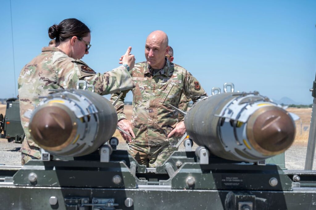 U.S. Air Force Chief of Staff Gen. Dave Allvin speaks with personnel during their inspection of GBU-38 bombs during his visit to Beale AFB, Calif. on May 28 (U.S. Air Force Photo)