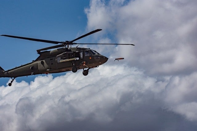 An Area-I Air-Launched, Tube-Integrated, Unmanned System, or ALTIUS, is launched from a UH-60 Black Hawk at Yuma Proving Ground, Ariz., March 4 where the U.S. Army Combat Capabilities Development Command Aviation & Missile Center led a demonstration that highlighted the forward air launch of the ALTIUS. (Courtesy photo provided by Yuma Proving Ground)