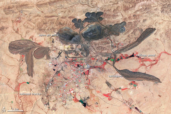 The Bayan Obo mining district in Inner Mongolia, China. The mines of the region have the largest known deposits of rare earth elements. (Image: NASA Earth Observatory images by Jesse Allen and Robert Simmon, using data from the NASA/GSFC/METI/ERSDAC/JAROS, and U.S./Japan ASTER Science Team)