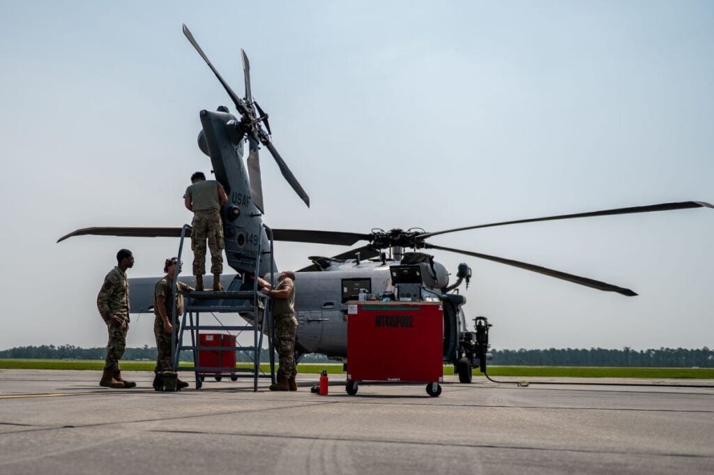 Pictured is a U.S. Air Force photo of personnel with the 41st Rescue Generation Squadron working on an HH-60W at Moody AFB, Ga. on June 2, 2025.