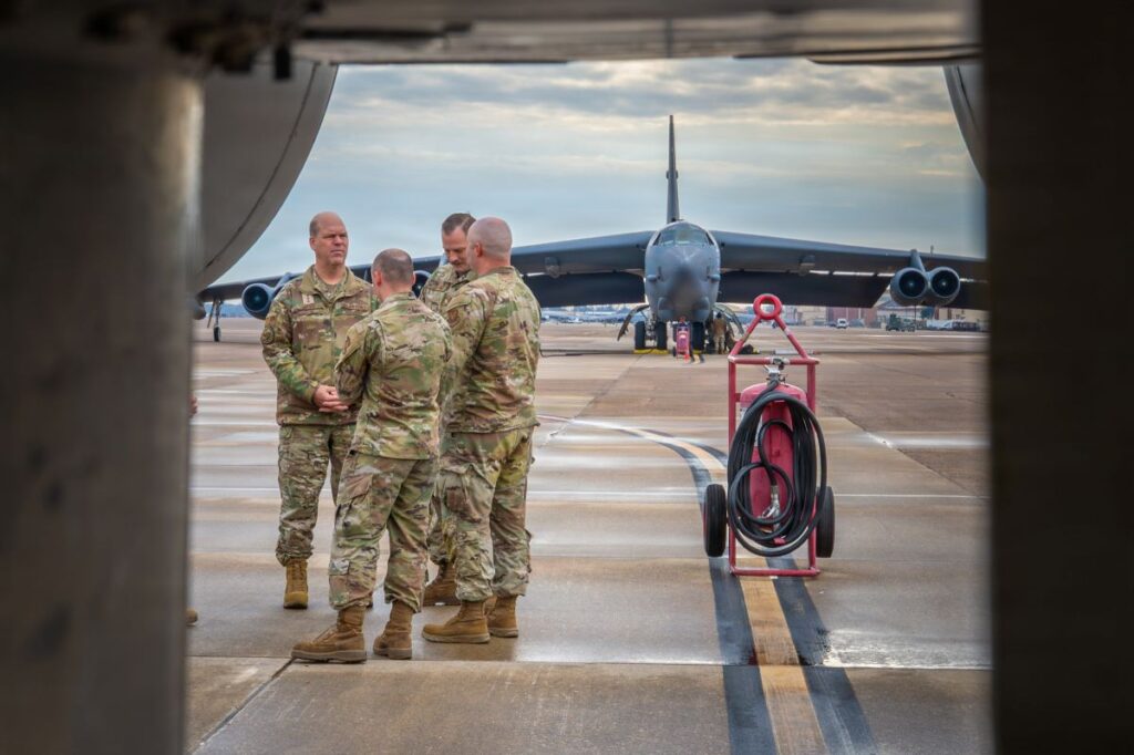 Pictured is a U.S. Air Force photo of Gen. Stephen Davis (left), the head of Air Force Global Strike Command, on the tarmac at Barksdale AFB, La. on Dec. 17, 2025 during a visit to mechanics with the 2nd Bomb Wing.