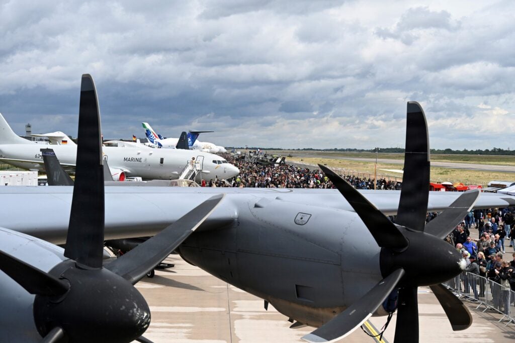 Thousands of visitors cross the flightline to see the aircraft that are on display during the ILA Berlin Airshow 2026 at Berlin-Brandenburg Airport, Germany, June 14, 2026, with a C-130J Super Hercules aircraft from the 136th Airlift Wing, Texas Air National Guard in the foreground. (Photo: Texas Air National Guard by Tech. Sgt. Tia Hambrick)