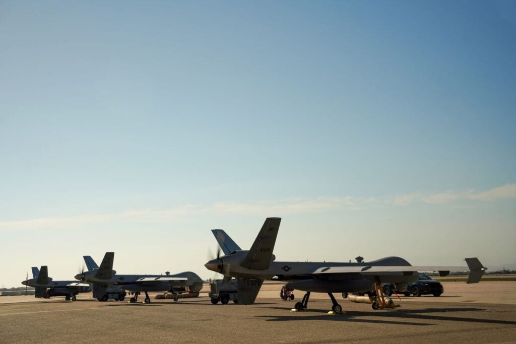 Pictured is a U.S. Air Force photo of three MQ-9A Reapers with the 432nd Wing, as they prepare to take off during Exercise Bamboo Eagle 25-3 on Aug. 5, 2025.